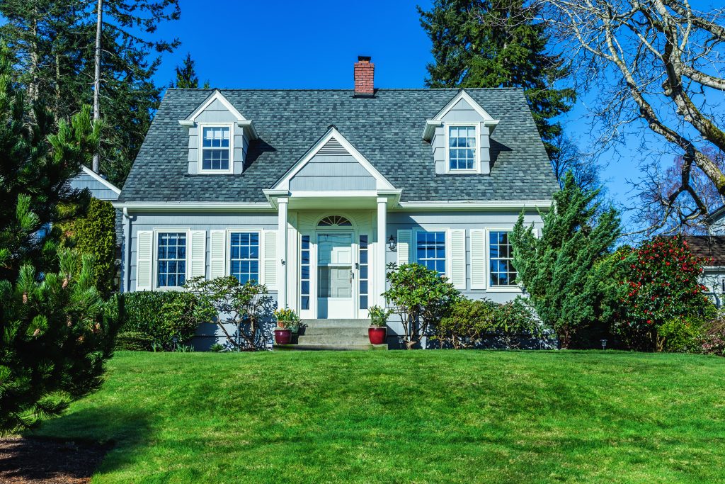 Cape Cod homes are characterized by a one and a half story design with a steep, gabled roof. The upper floor is usually a finished “attic” with full-height ceilings only in the middle of the floor and sloping ceiling walls to the sides of the rooms. These homes often have a large central chimney, dormer windows and little external ornamentation.