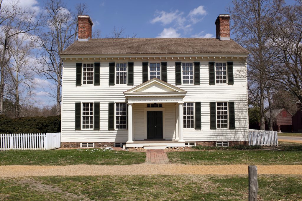 Colonial homes have a symmetrical, two-story design. These homes often have decorative crown molding, shutters and pillars.