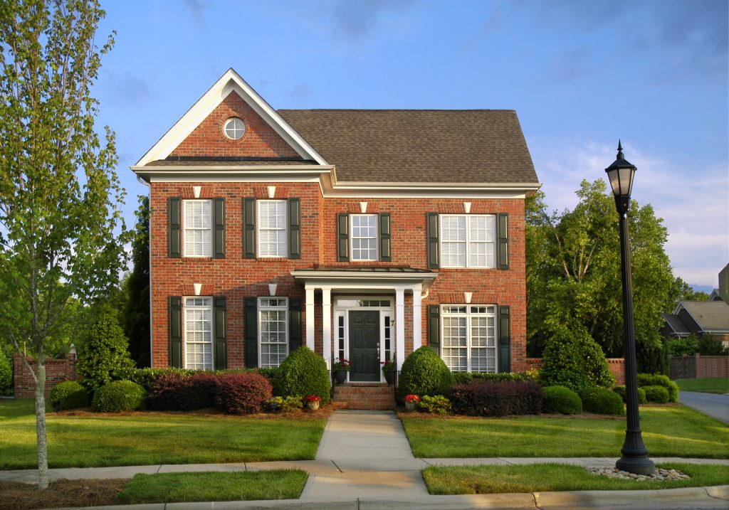 Classic and elegant, Traditional homes feature timeless elements such as brick exteriors, covered porches, and steep rooflines—blending comfort with curb appeal.